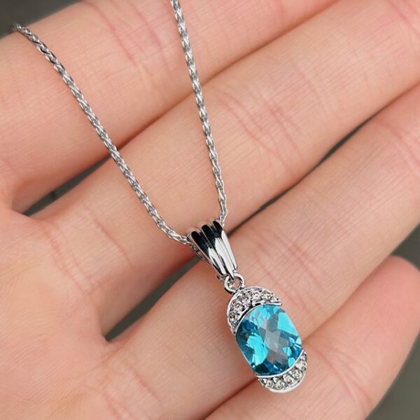 Estate Blue Topaz & Diamond Pendant