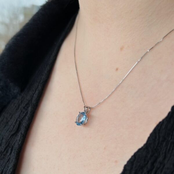 Recycled White Gold Oval Blue Topaz Pendant - Image 3