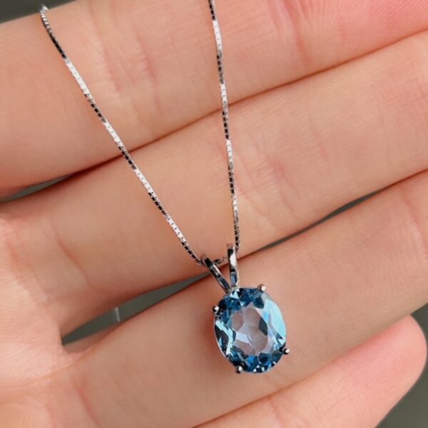 Recycled White Gold Oval Blue Topaz Pendant